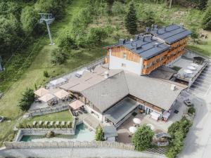 an overhead view of a house with a roof at Hotel Selva in Folgarida