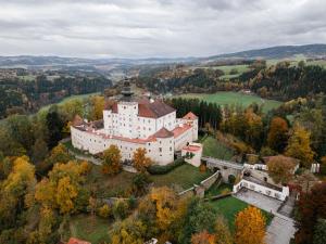 an aerial view of a castle on a hill at Schloss Weinberg in Kefermarkt