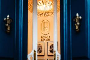 a close up of a door with a trophy at Royale Sainte Hélène Boutique Hotel in Birkirkara