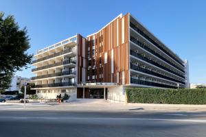 a largeartment building with a street in front of it at Alua Linda Mallorca - Newly Renovated 2026 in Can Pastilla