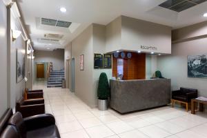 a lobby of a hospital with a waiting room at Kent Hotel in Bursa +10 photos