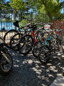 a group of bikes parked next to a fence at Biser jezera in Gornja Šuma +36 photos