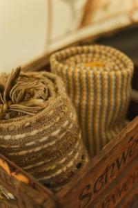 a wooden basket with a vase on top of it at Devon Belltents - Salcombe in Soar +9 photos