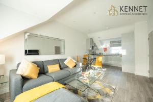 a living room with a couch and a glass table at Chester House in Reading +28 photos