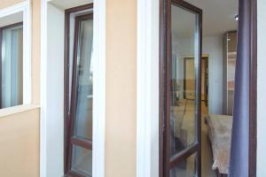 two windows on the side of a building at Polarstar Beach Resort - Premium Apartments in Sveti Vlas