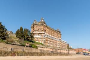 a large building on the side of a hill at The Grand Scarborough in Scarborough
