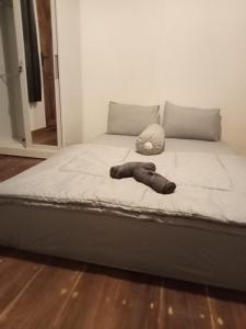 a bed in a bedroom with a large mattress at A2 Coconut in Pulau Sarang +10 photos
