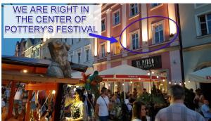 a sign that says we are right in the center of a festival at Apartament Przy Starówce - Bella - 2 Osobne Sypialnie, 2 Separate Bedrooms in Old Town - Main Square, Amazing View, Top Location! in Bolesławiec