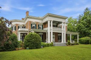 a large brick house with a large yard at Rockwood Manor Bed & Breakfast in Dublin