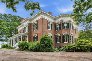 a large red brick house with white trim at Rockwood Manor Bed & Breakfast in Dublin