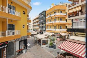 an overhead view of a city street with buildings at Beach 2-bedroom in Los Cristianos in Los Cristianos