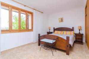 A bed or beds in a room at Villa César Még 16 kép