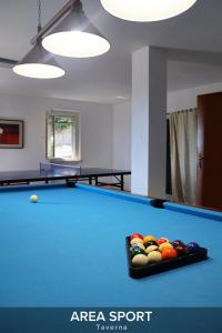 a room with a pool table with balls on it at Villa Gelsi a Pesaro in Pesaro