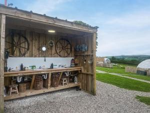 a wooden shed with a sink and a counter at Pinhaw Beacon - Ukc9595 in Earby