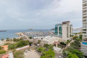 an aerial view of a hotel and a beach at Eira: Luxury and Serenity by the Sea in Santa Marta in El Prado