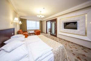 Voodi või voodid majutusasutuse Hotel Gołębiewski Wisła toas