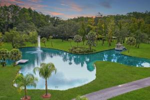 an aerial view of a swimming pool in a park at Charming Oasis - Ultimate Rustic Getaway! in St. Augustine