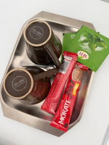 a metal container filled with different types of food at Apartment Amila in Jajce