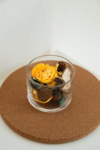 a glass bowl of food on top of a hat at Ca' Foega rooms in Chioggia