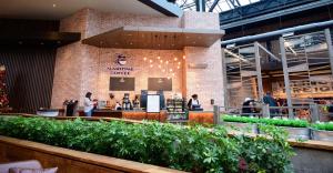 a restaurant in a building with a brick wall at Bally's Baton Rouge Hotel in Baton Rouge