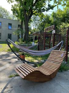 a couple of hammocks sitting in front of a store at Noclegi Kolejowa in Rybnik