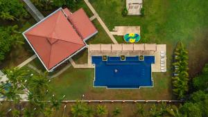an overhead view of a house with a swimming pool at Best Western Jaco Beach All Inclusive Resort in Jacó +92 photos