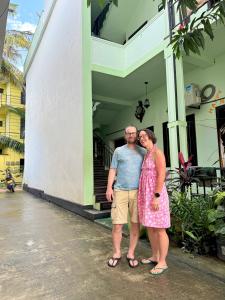 a man and a woman standing in front of a house at SSF Green Home in Akkaraipattu