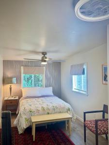 a bedroom with a bed and a window and a ceiling at Providence & 18th in Chester