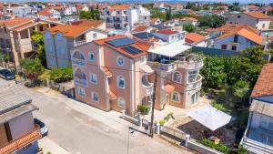an aerial view of a city with buildings at Garden House Vodice in Vodice +7 photos