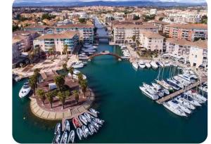 an aerial view of a marina with boats in the water at Duplex centre historique frejus in Fréjus