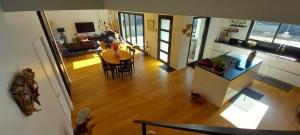an overhead view of a living room and a dining room and kitchen at Chambres D'Hotes Chez Sylvie in Cancale