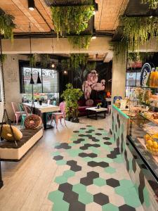 a room with a store with a checkered floor at Global Home - Aparthotel - No Contact Check In in Mielec