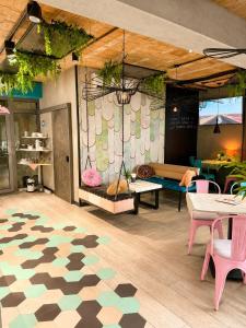 a room with a table and chairs and a couch at Global Home - Aparthotel - No Contact Check In in Mielec