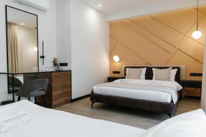 Tempat tidur dalam kamar di Select Hotel +165 foto