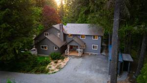 an aerial view of a house in the woods at Evergreen Lodge in Deming