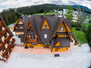 an aerial view of a house with a roof at Willa Stachoniówka in Zakopane