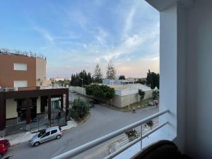 a view of a parking lot from a building at Casa Cómoda in Nabeul