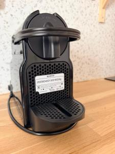 a blender sitting on top of a wooden table at Summer vibes Béziers centre in Béziers +5 photos