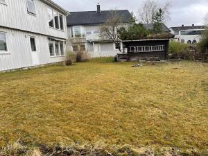 an empty yard in front of a house at Best place to live in Trondheim +1 photo