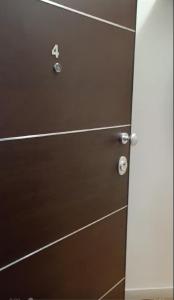 a pair of brown drawers with the number four on them at DOWNTOWN 4 in Alexandroupoli
