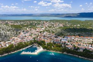 an aerial view of a city with a harbor at Villa DaEva in Drage