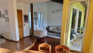 a living room with a view of a living room at Casa Super Vista a los Andes in Santiago