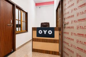 a sign that says ovo in front of a door at SPOT ON ROYAL KING HOTEL in Lucknow