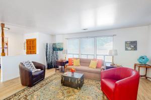 a living room with a couch and a chair at See Star Ranch in Nipomo