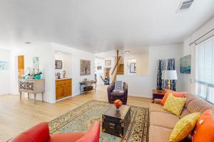 a living room with a couch and a table at See Star Ranch in Nipomo +21 photos