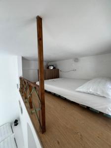 a bedroom with a bunk bed in a room at Nostalgia Traditional Home in Skiros