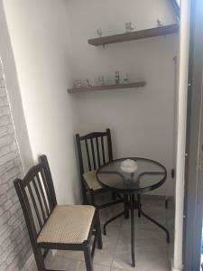 a table and two chairs and a table and chairs at Fatos in Pogradec