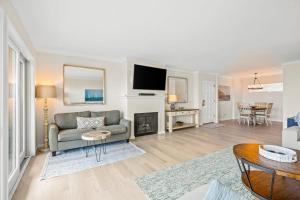 a living room with a couch and a fireplace at Beach Retreat in Santa Barbara