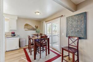 a kitchen and dining room with a table and chairs at Ramona Memories in Grover Beach