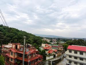 a view of a city with buildings at Hi Hostels Shillong in Shillong